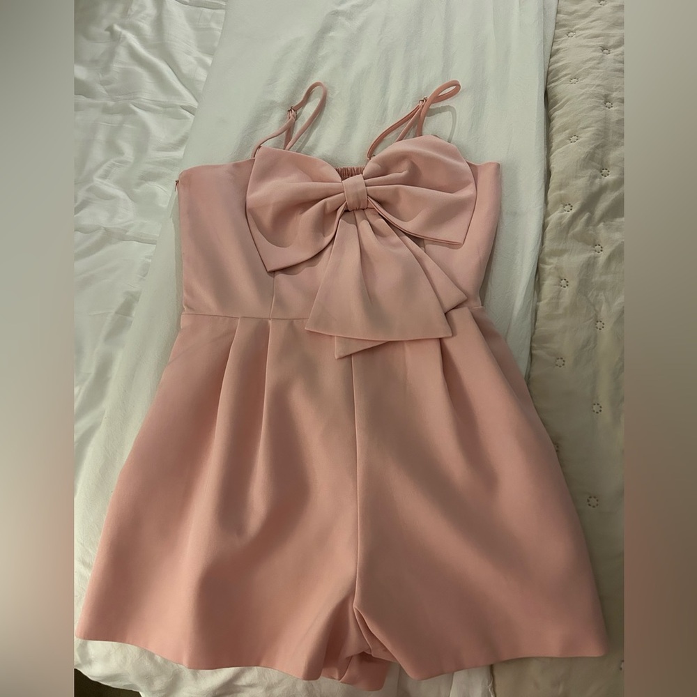 Blush pink bow romper!